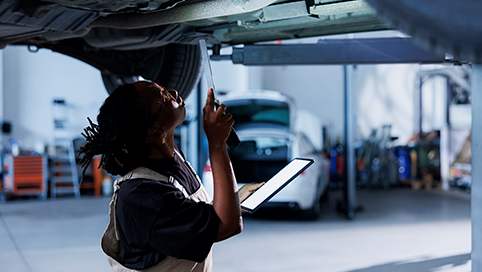 Inspector checking a car